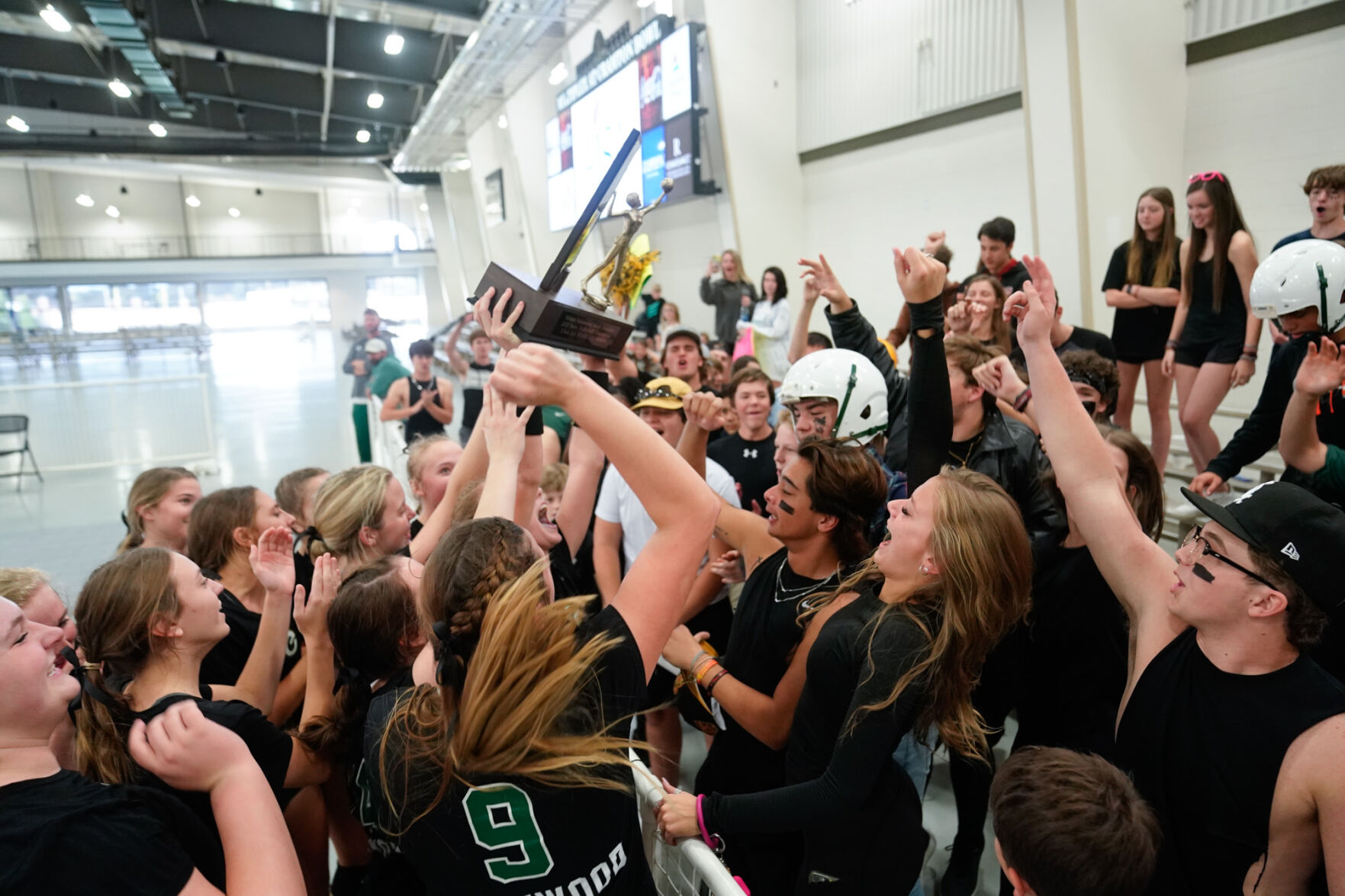 Edgewood Academy VB trophy with students